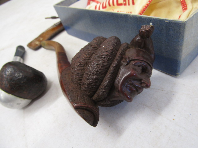 A Falcon pipe and a carved jester pipe in a Duncan box along with pipe cleaner in leather pouch - Image 2 of 7