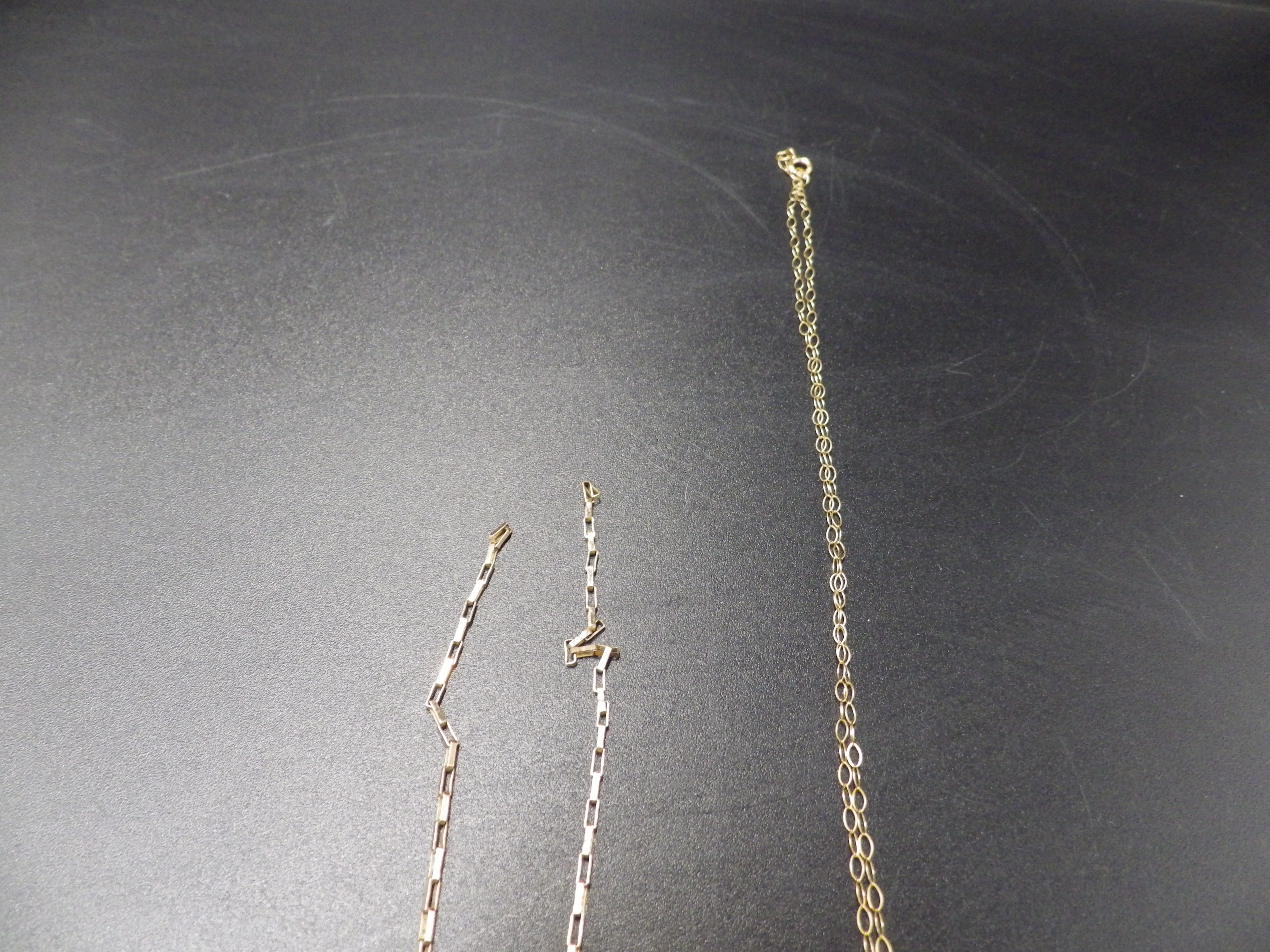 2, 9ct gold chains with cross pendants one chain broken. 4.44g total weight. - Image 3 of 3