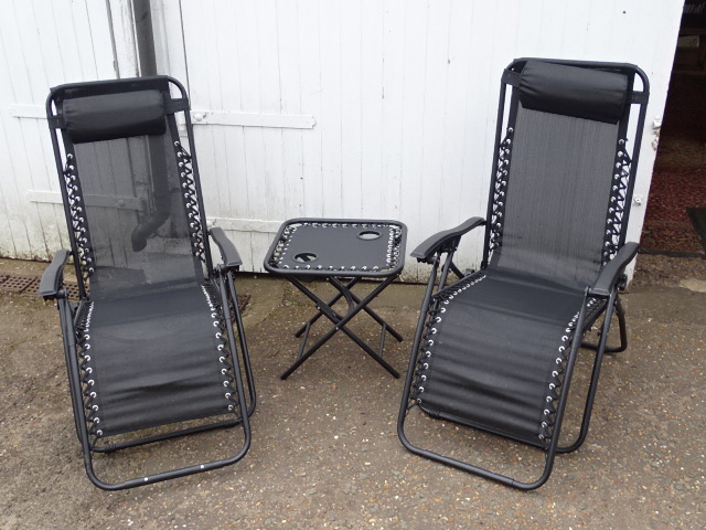 Pair of folding garden chairs/loungers with side table and another folding chair