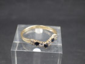 9ct gold, cubic zirconia and sapphire ring, size O, 1.33g total weight.