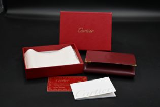 Cartier calf skin leather credit card wallet embossed with makers logo to centre,and with gold