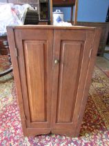 An oak base cabinet (from a desk)