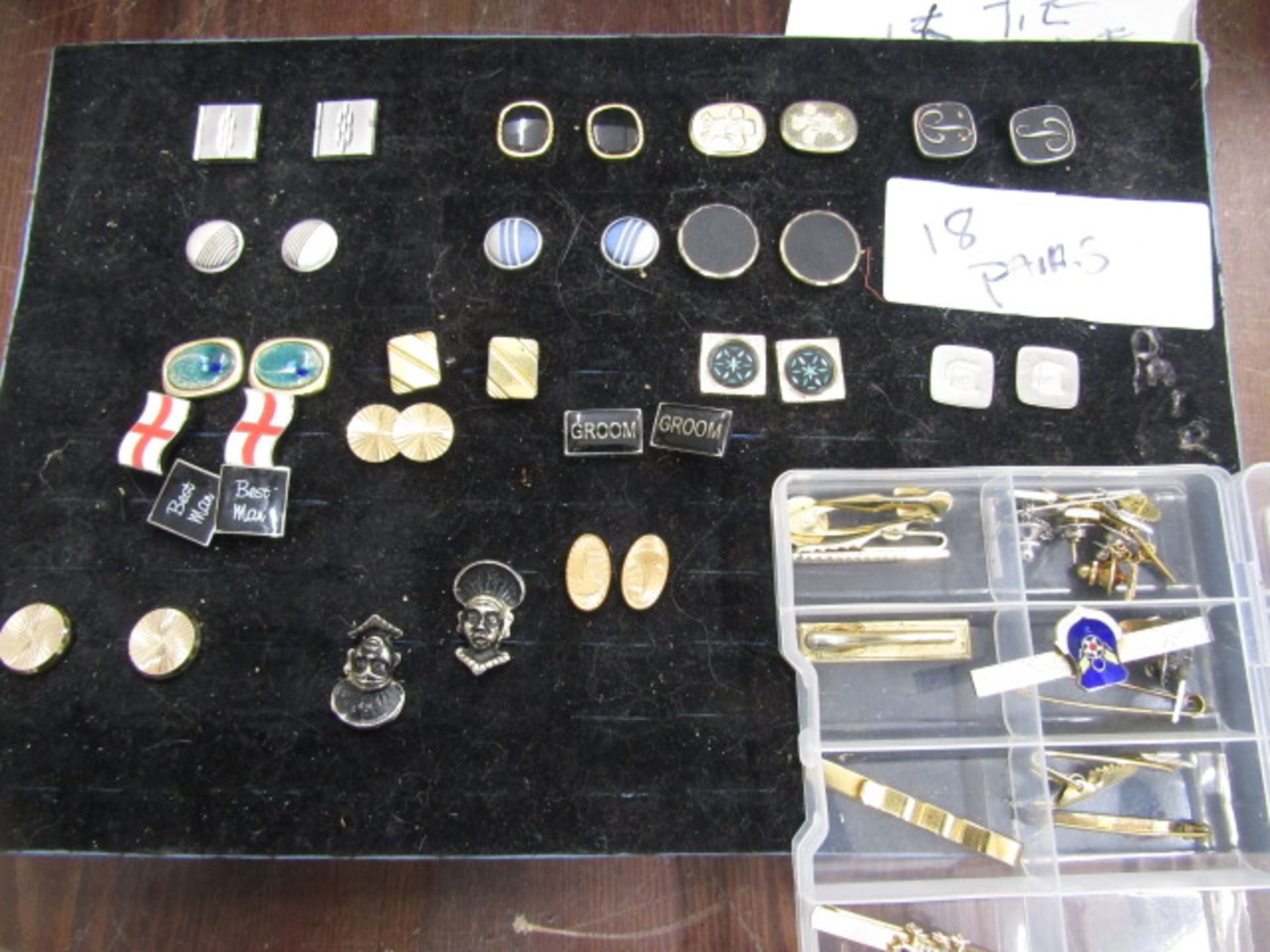 18 pairs cufflinks and 15 tie pins