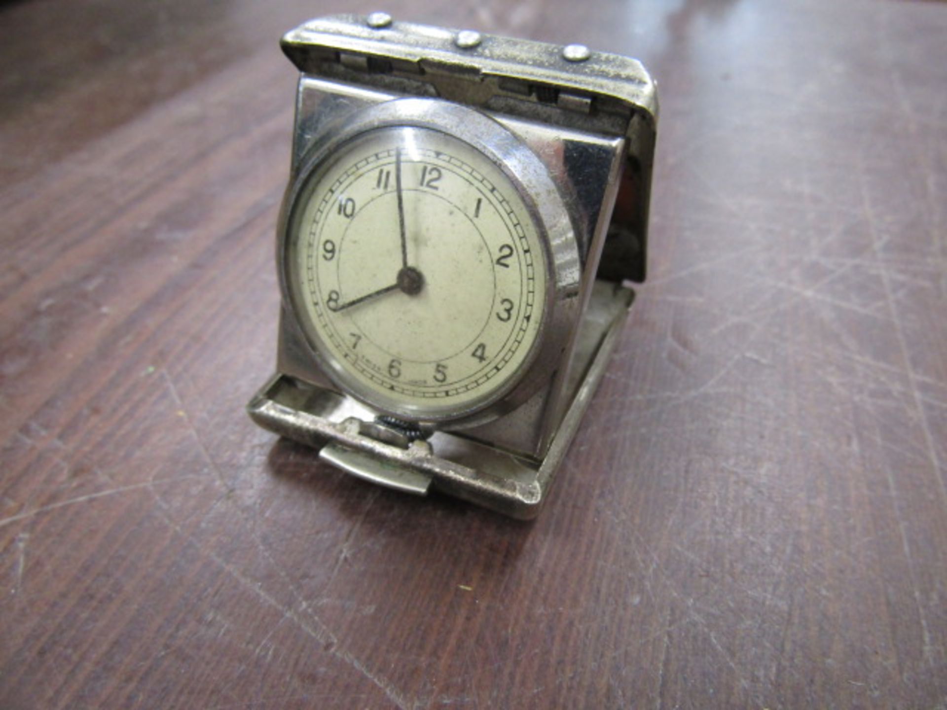 An art deco folding travelling clock 3.5x5 cm