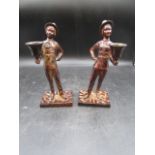 A pair of Bronze bell ringers 20cm H