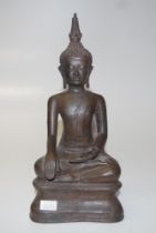 Thai meditating bronzed Buddha