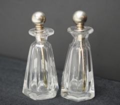 Two sterling silver and cut glass snuff bottles