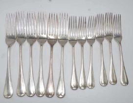 Twelve Christofle silver plate forks