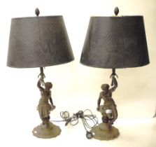 Pair of bronze / brass figural electric lamps