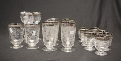 Suite of eighteen various sized etched glasses
