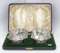 Cased set of two sterling silver pierced baskets