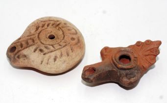 Two various Roman terracotta oil lamps