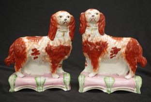 Two Staffordshire flat back Spaniel mantle dogs