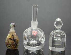Three various glass perfume bottles
