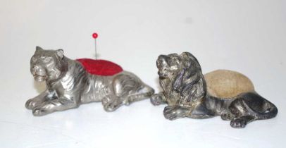 Two antique metal animal pin cushions