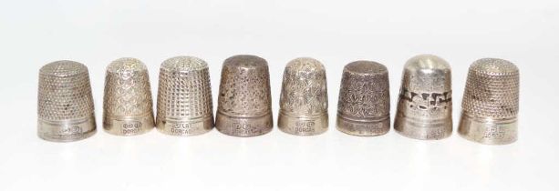 Eight vintage Dorcas thimbles