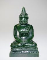 Oriental carved green jade Buddha figure