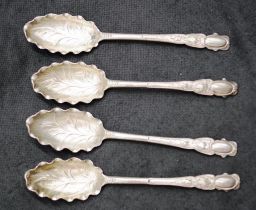 Four Antique Roccoco silver foliate spoons