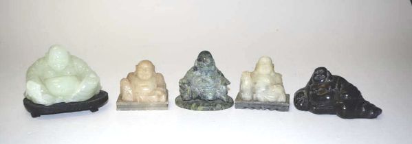 Five Oriental carved 'Laughing Buddha' figures