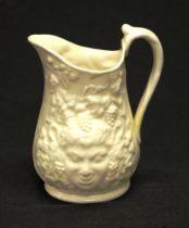 Early Belleek porcelain in relief face jug