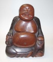 Oriental carved wood 'Laughing Buddha' figure
