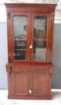 Antique mahogany elevated bookcase