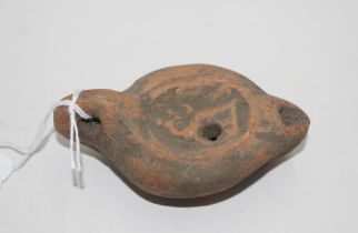 Roman terracotta oil lamp