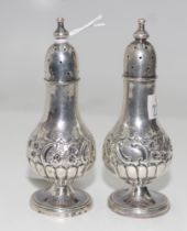 Pair of sterling silver salt & pepper shakers