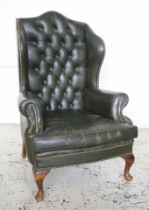 Leather wing back Chesterfield armchair