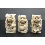 Three Japanese carved bone sage netsukes