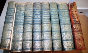 Eight antique volumes 'Dicken's Works'
