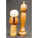 Two good Japanese Kokeshi wooden dolls