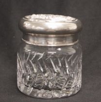 Cut crystal jar with embossed silver plate lid