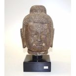 Good Cambodian carved stone Buddha head & stand
