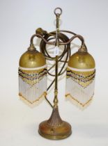 Vintage brass based decorated electric table lamp