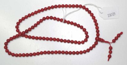 Chinese string of coral Buddhist beads