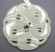 Chinese carved jade coin form toggle