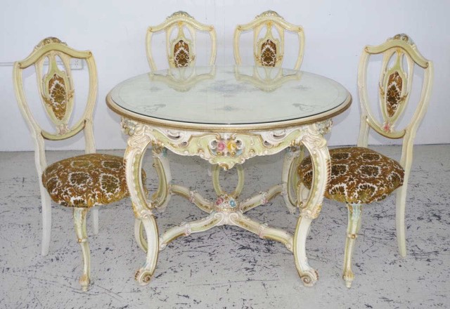 Ornately carved round table & 4 chairs