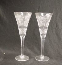 Two Waterford cut crystal toasting flutes