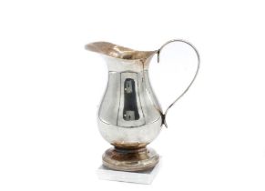 Mid C. sterling silver creamer