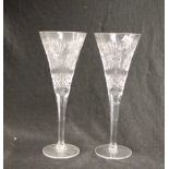 Two Waterford cut crystal toasting flutes