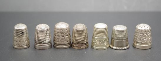 Seven various vintage silver metal thimbles