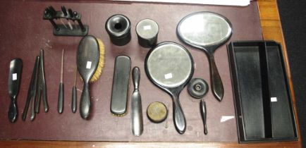 Extensive early lady's ebony dressing table pieces