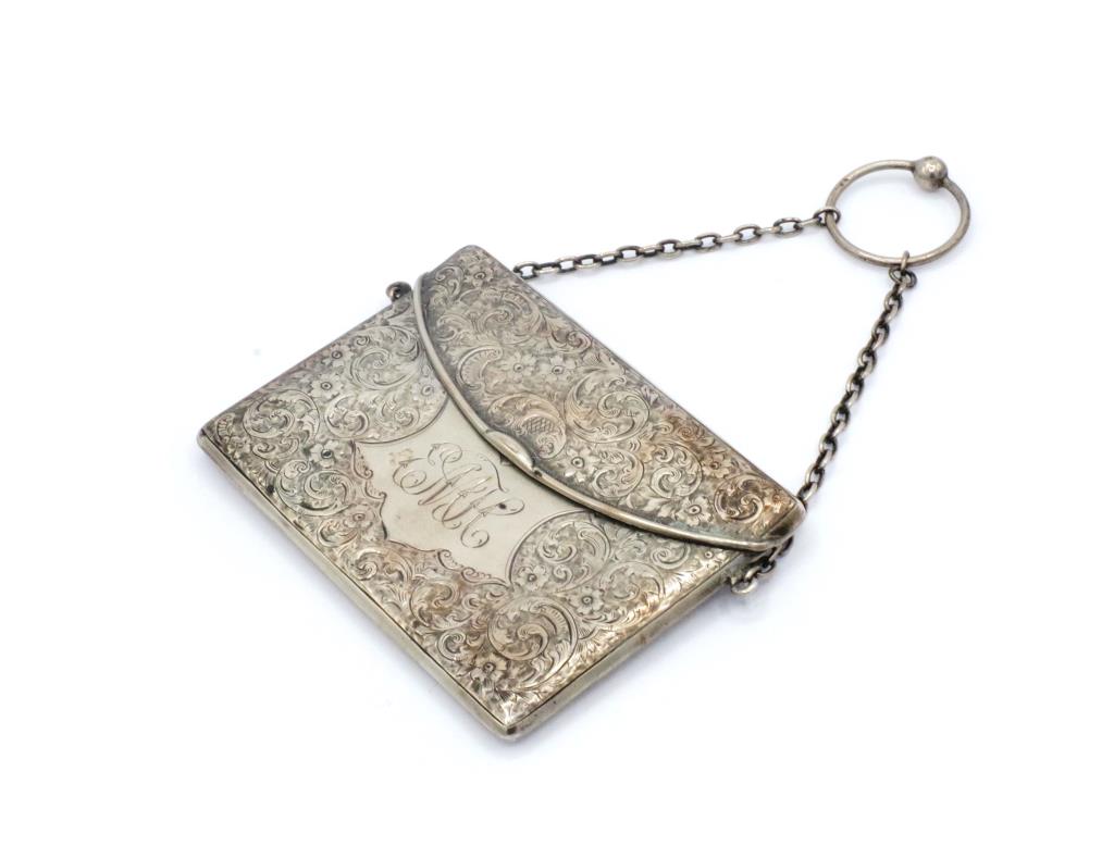Edwardian silver spring loaded purse