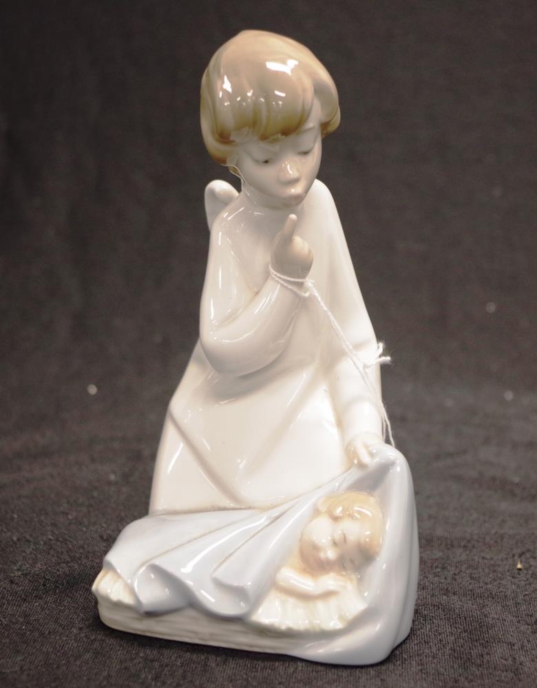 Lladro angel form boy figure