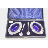 Pair of cased Edwardian sterling silver open salts