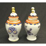 Antique pair of French porcelain lidded urns