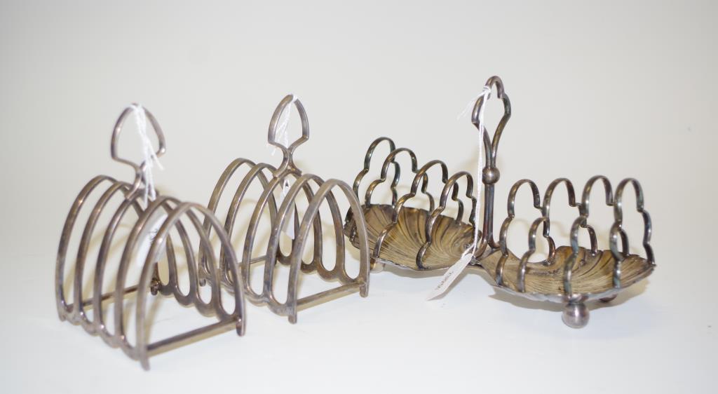 Three silver plate toast racks