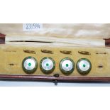 Cased set four vintage MoP buttons