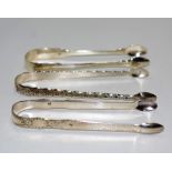 Three various Georgian sterling silver sugar nips